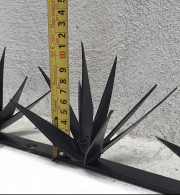 Protecciones perimetrales en acero 8 puntas filosas.