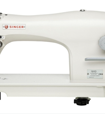 Maquina de coser Singer 191-D, con mesa y motor