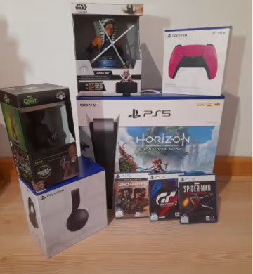Paquete Sony PlayStation 5 con 2 controles (PS5), 4 juegos, auriculares y 2 soportes para controles